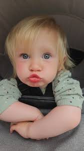 Hi there 😊 Would anyone be able to help enhance this photo by adding a  nicer background and removing the drool