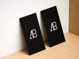 It features a vertical card standing against the wall. Horizontal And Vertical Business Cards Showcase Mockup Mockup World