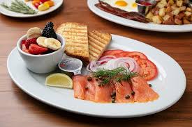 If you think smoked salmon only goes on bagel sandwiches, think again. Breakfast Smoked Salmon Plate Sustainable Smoked Salmon Capers Red Onions Tomatoes Cream Cheese And Plain Bagel Picture Of Panini Kabob Grill Rancho Cucamonga Tripadvisor