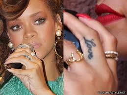 These photos of small tattoos will prove you that bigger is not always better. Rihanna S Tattoos Meanings Steal Her Style
