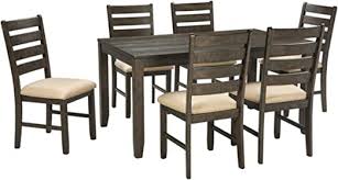 Shop ashley furniture homestore online for great prices, stylish furnishings and home decor! Amazon Com Signature Design By Ashley Rokane Dining Room Table And Chairs Set Of 7 Brown Table Chair Sets