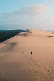 #dunedupilat monument naturel exceptionnel et protégé du #bassindarcachon. Sunset At Dune Du Pilat France In 2021 Dune Travel Destinations Unique Cool Places To Visit