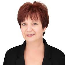 Melanie Benjamin, Realtor