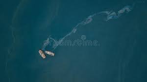 The strategic locations of these stockpiles ensure rapid effective response and mobilization of pimmag resources in the event of an oil spill. Fishing Boats And Oil Spill Stock Photo Image Of Drone Boat 125602416