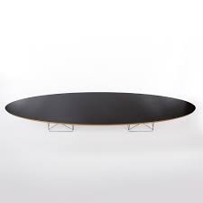 Tempered glass shelf and white marble combine for a great contemporary look. Eames Etr Table Eames Surfboard Table Eames Com