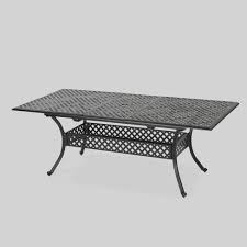 Accessorize a complete patio dining set with functional side tables that can hold drinks, a good book or a pair of sunglasses. Abigail Rectangle Cast Aluminum Expandable Outdoor Patio Dining Table Copper Christopher Knight Home Target