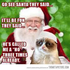 Grumpy Cat Sits On Santa S Lap Grumpy Cat Humor Grumpy Cat Christmas Grumpy Cat Quotes