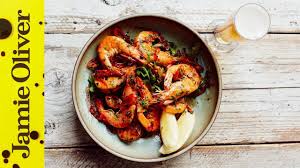 Add the prawns, marinade and orange wedges and cook for 5 to 6 minutes, or until the prawns are crisp and opaque, then arrange on top of the couscous, getting all the juices out of the pan and onto the couscous. Chilli Garlic Prawns With Beer Matching Video Jamie Oliver