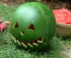 Cut a small, thin, flat piece from the bottom of the watermelon to provide a stable base for carving. Halloween Watermelon Lantern My Kid Craft