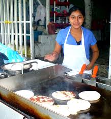 Read up on some of my favorite things from the very small country that is near and dear. El Salvador San Salvador Young Woman Preparing Papusas At A Roadside Stand Papusas Are Thick Tortillas That El Salvador Food Salvadoran Food Salvador Food