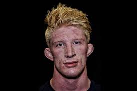 Ben Lowy Took Post-Match Photographs of NCAA Wrestlers — Bird In Flight