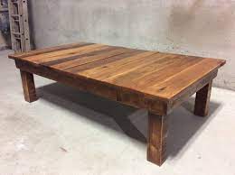 As far as height is concerned, the cocktail table should be the same height as the seating heigt of your sofa or sectional. Large Reclaimed Wood Coffee Table