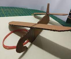 I made a toy motorcycle using cardboard and paper. Diy Rubber Band Powered Cardboard Plane 8 Steps Instructables