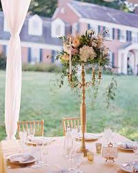 29 Tall Centerpieces That Will Take Your Reception Tables To New Heights Wedding Centerpieces Wedding Centerpieces For Sale Candelabra Wedding Centerpieces