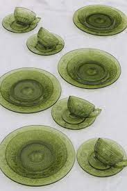 The buffet (our apologies, martha!). Vintage Indiana Daisy Pattern Glass Dishes Avocado Green Glass Plates Cups Saucers