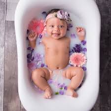 I give one warning, sit down or get out the next time they stand, they are out of the bath. Curly Queens On Instagram Describe Her Jaxon Faya Curlykweens Baby Milk Bath Spring Baby Pictures Baby Photoshoot Girl