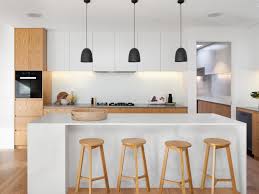 Cove ceiling with recessed spot lights and pendant lights adds drama and warmth to this kitchen. 6 Ways To Resolve Common Kitchen Lighting Problems Architectural Digest India