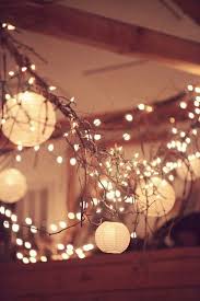 Such Enchanting Lights For A Wedding The Mix Of Lanterns And Small Lights Tangled In Tree Branches Is Just S Wedding Lights Wedding Decorations Paper Lanterns