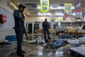 Looters make off with goods at a store in durban, south africa, monday july 12, 2021. Ykhzte5yi9 Xwm