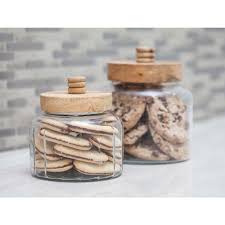 Litton Lane Cylindrical Clear Glass Jar With Brown Wood Lid Set Of 2 In 2020 Ceramic Kitchen Canisters Glass Kitchen Canisters Clear Glass Jars