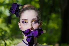 105 Beautiful Girl Holding Purple Iris Stock Photos