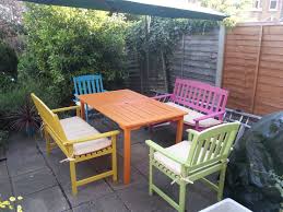 Candy Coloured Garden Suite Sure To Make You Smile Even When The Typical Uk Weather Rear Garden Furniture Uk Painted Garden Furniture Painted Outdoor Furniture