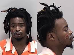 DUMBEST CROOK OF THE YEAR? Here's the painful-looking mugshot of Terrell  Beatty and a picture of the Georgia State Patrol vehicle that he RAN INTO  while fleeing cops in Augusta