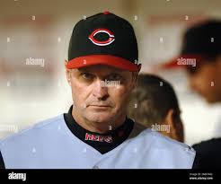 Cincinnati Reds manager Jerry Narron (41) talks with home plate umpire  Lance Barksdale at the start of a baseball game against the Washington  Nationals, Wednesday, May 23, 2007, in Cincinnati. (AP Photo/Al