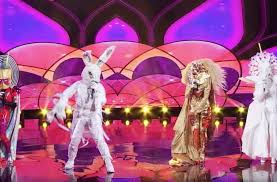 The Masked Singer Watch The First Group Performance Lion And Unicorn Singer One Singer