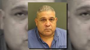 OIA worker accused of taking bribes from unlicensed taxi drivers