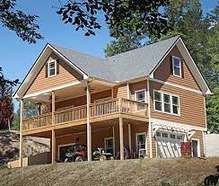 Plan 24114bg Vacation Cottage With Drive Under Garage Sloping Lot House Plan Small Cottage Plans Cottage Plan