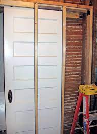 Referring to the door frame kit instructions, i placed a nail on each stud for the kit rest on while installing. How To Install A Pocket Door In 4 Steps Old House Journal Magazine