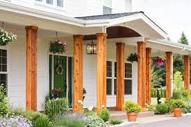 .cedar post base porch posts were warped at the porch post base trim and columns on new construction have peeled cedar post is pretty columns composite railing porch posts. Adding Cedar Pillars To Our Dream House Front Porch Design House Front Porch Front Porch Columns