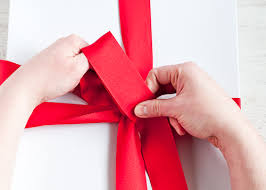 Continue looping the ribbon back and forth until you have at least four loops on each side. How To Tie A Bow 4 Secrets Living Well Design Mom
