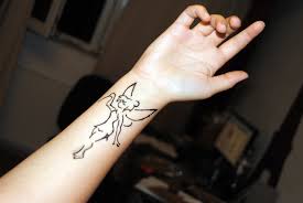 Cartoon characters are among the most popular tattoo. Black Outline Tinkerbell Tattoo On Wrist