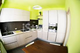 Say goodbye to the pinks, greens, and blues from the nightmare kitchens of the past. Modern Yellow Green Kitchen Fisheye Stock Photos Freeimages Com