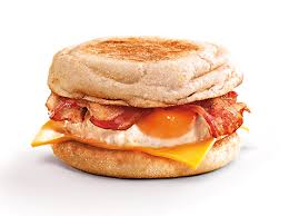 It is made with bacon, eggs (typically fried or scrambled), cheese and bread, which may be buttered and toasted. Bacon Egg And Cheese Muffin Bacon Wiki Fandom