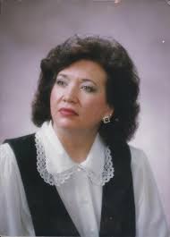 Claude Adams coached basketball at Garfield High School in Panguitch from  1936 to 1945, and then coached in Parowan where he grew up. The coach,  Claude Adams is the father of Joan