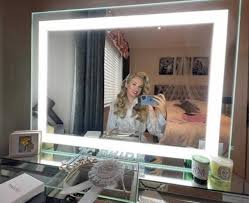 For other uses, see looking glass (disambiguation). Crystal Pro Mirror 80 X 60cm Hollywood Mirrors