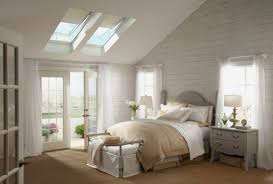 When you have a sloped ceiling in your bedroom, it's a good idea to place the head of the bed under the lowest 11. Design Ideas For A Beautiful Sloping Ceiling Bedroom