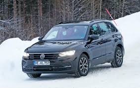 While the golf 8 phev is being offered in two versions with 150 and 180 kw system power, the tiguan ehybrid will only be offered with the more powerful 180 kw phev. Restyled 2021 Vw Tiguan Hides Golf Mk8 Face Under Deceptive Camouflage Carscoops