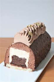 Buche Chocolat Vanille Glacage Rocher Recette De Noel Olivia Patisse Chocolat Vanille Recette Dessert Noel Recette Gateau Noel