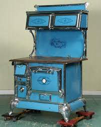 When it comes to antique wood stove restoration, bill eckert is the master. Early 1900 Cast Iron Wood Burning Cook Stove Qui Jun 03 2005 Flomaton Antique Auction In Al Wood Burning Cook Stove Antique Stove Vintage Stoves