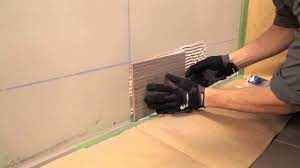 The only way that this can happen without detailed planning and careful measurements is by installing the tile on the floor of the shower first. Rona How To Install Wall Tiles Youtube
