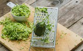 Freeze fresh shredded zucchini in food storage bags, as it does not require blanching and will keep for several months without loosing flavor. How To Grate Zucchini Using A Grater Food Processor Or Spiralizer