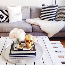 Theme Living Room Chic In Gray Black And White Gold Other Gold Object The Skull Is A Little Creepy Sheepskin Home Decor Chic Living Room Home Living Room