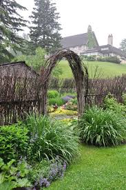 A Willow Garden In The Rolling Hills Of Caledon Ontario Willow Garden Garden Backyard Landscaping