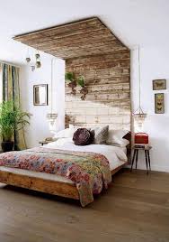 Exterior plaster wall with white window with shutters, showing interior pallet bedroom, blank background with copy space 25 Pallet Bed Ideas And Projects Home Stratosphere