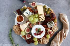 Unless you're serving the cheese cubed or already sliced, cheese knives should accompany the platter so guests can serve themselves. How To Make A Perfect Cheese Board Del S Cooking Twist
