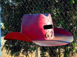 A mailbox stands alone in a kansas corn field as the sun sets beyond the horizon. Creative Mailboxes You Don T See Regularly